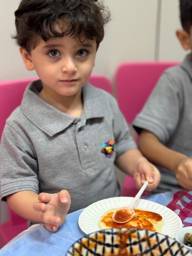 Children learning and playing at Tiny Tots