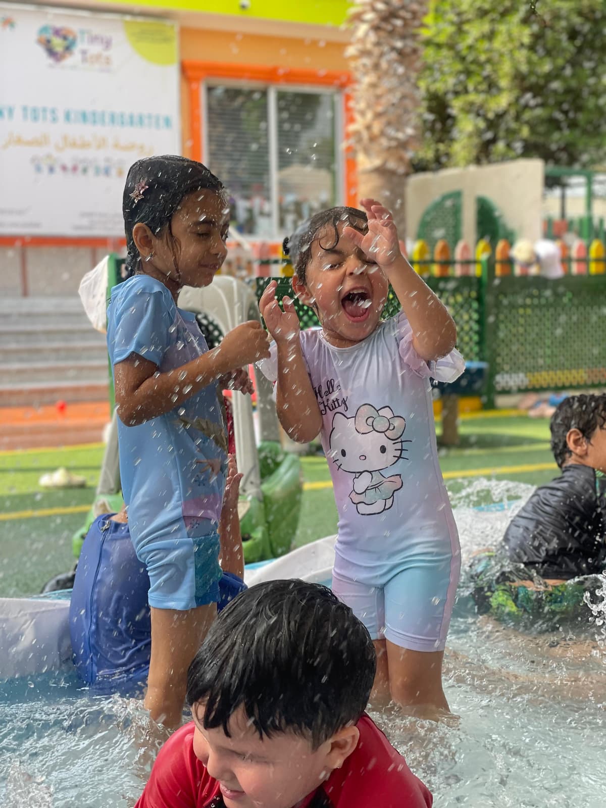 Children playing and learning at Tiny Tots